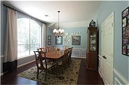 Formal dining off entry and adjacent to kitchen with privacy butler doors