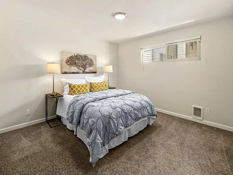 Large bedroom with newer carpet.