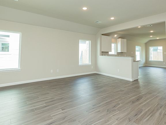Family Room to Kitchen and Dining Area