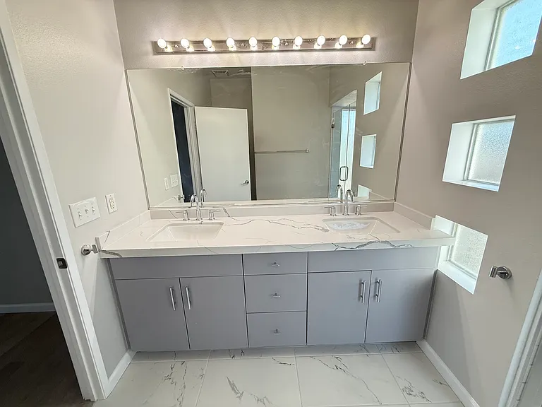 Primary Bathroom: Vanity with Brand New Quartz Counter-Top