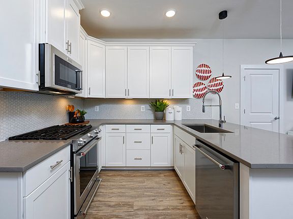 The Lawrence Kitchen with KitchenAid Stainless Steel Appliances at Crown in Gaithersburg, MD.