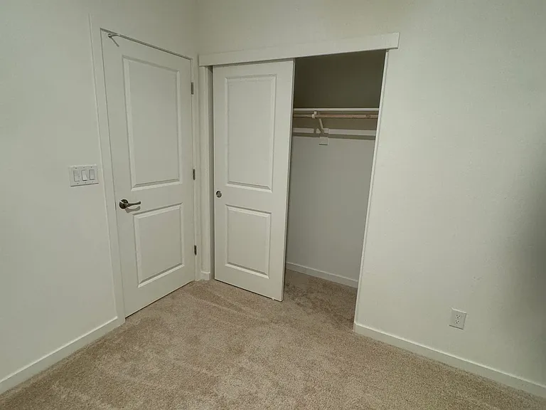First floor Bed room with closet sliding door open view