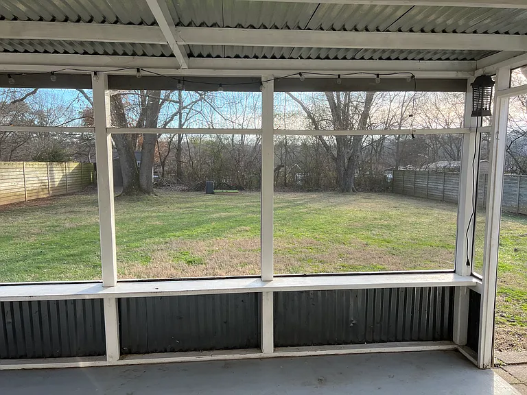 Backyard with screened in porch