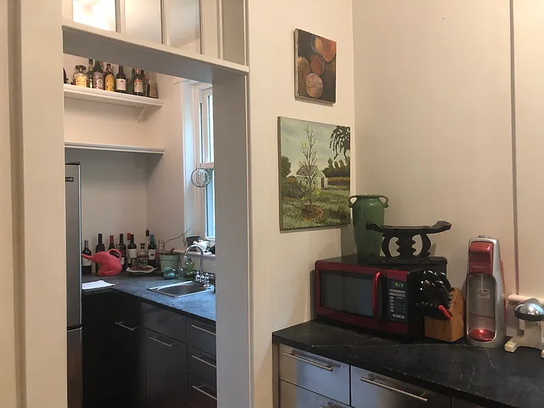 Second small room off the kitchen for the refrigerator, 2nd sink, and another window.