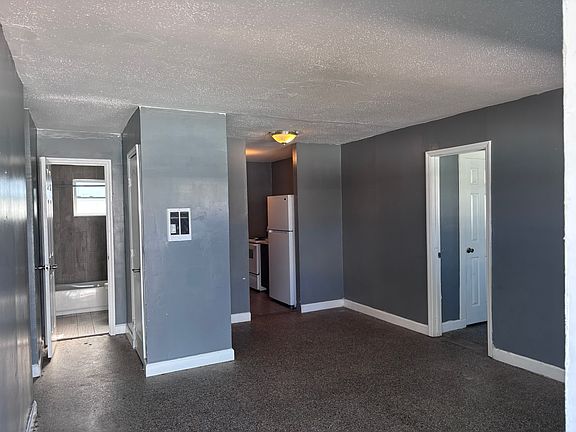 Entrance view of living room and kitchen