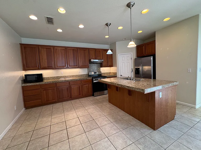 Open Concept Kitchen w/ Stainless Steel Appliances