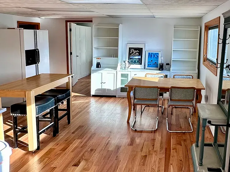 Dining room with pantry and beverage bar.