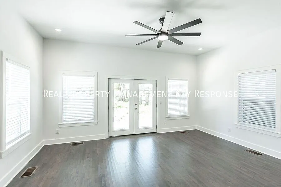 Modern 4-Bedroom Nashville Home with Flexible Living Space, Covered Patio & Downtown Access — Photo 3
