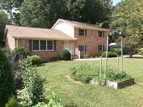 Raised-bed veggie garden, nicely landscaped yard