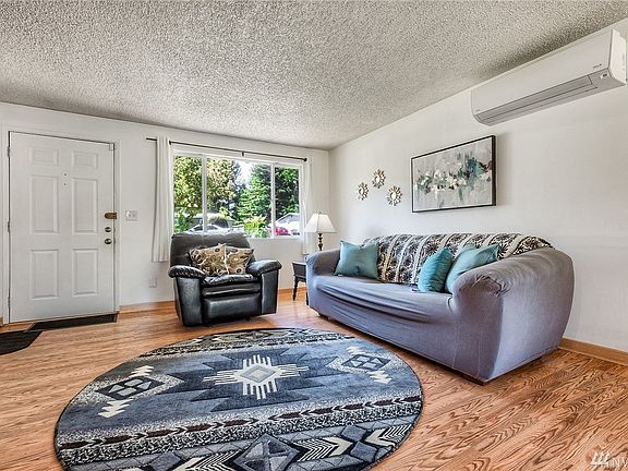 Large front window lets loads of light in. There are vinyl windows throughout the home.