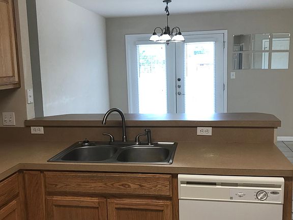 Breakfast Bar Overlooking Dinette - Double Doors to BackYard