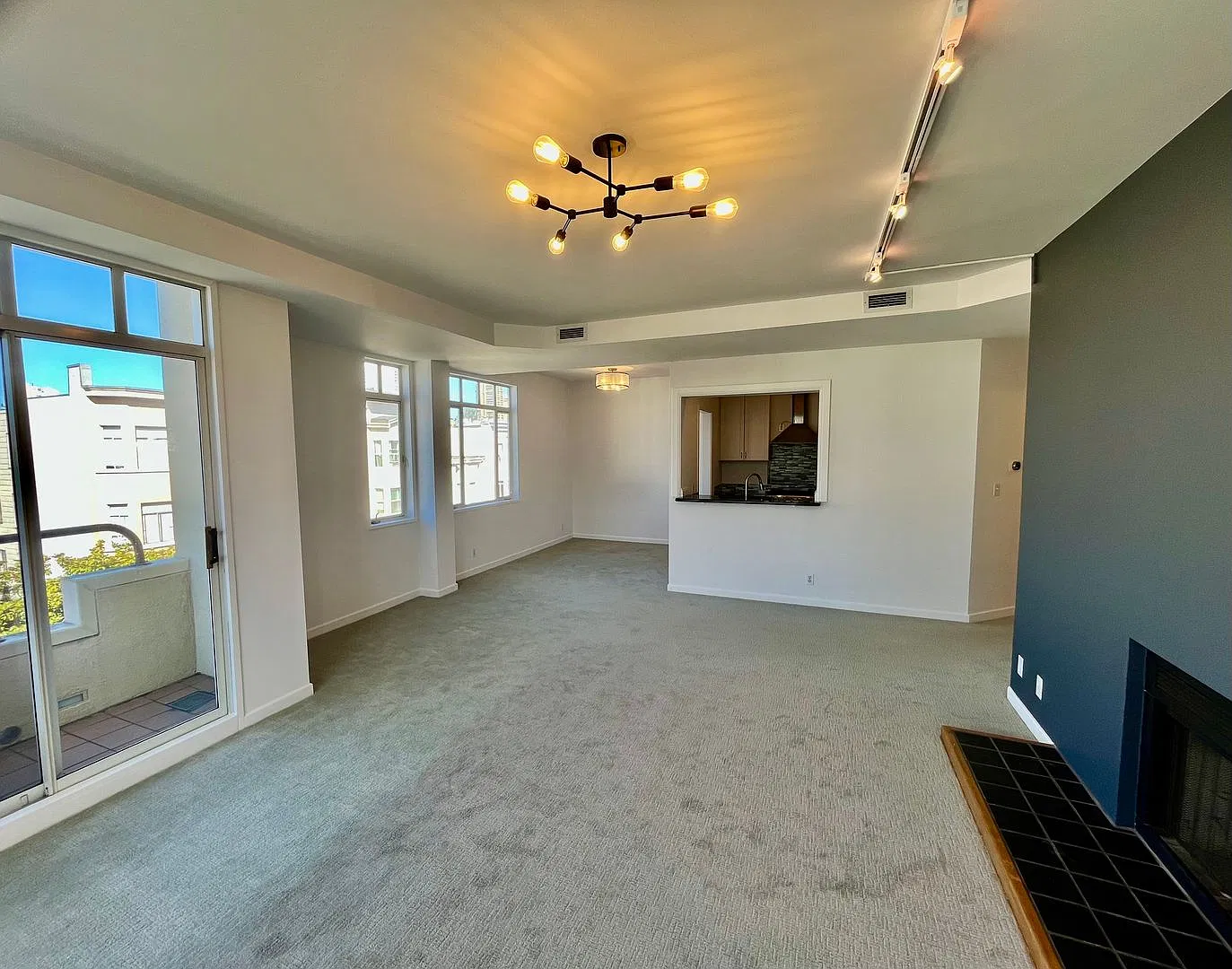 Bright, Updated Condo with In-Unit Laundry, Dual Balconies & Parking — Photo 2