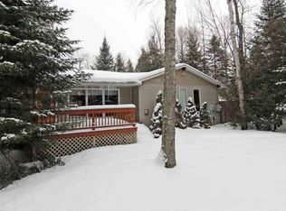 14486 Birch Pointe Dr, Kewadin, MI 49648