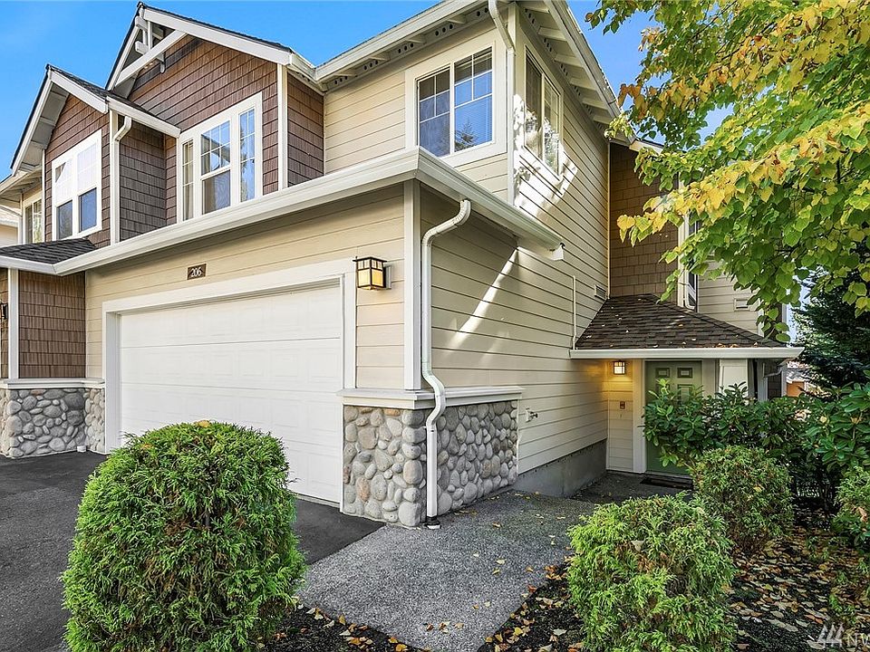 Two car garage attached with parking in front.