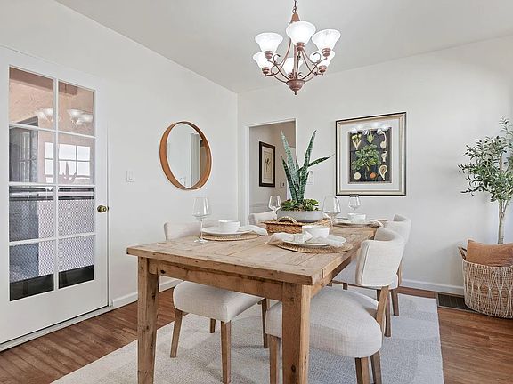 Dining room includes door to balcony
