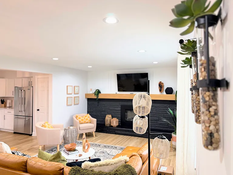 Open concept living with fireplace.