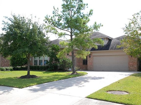 This 1.5 story home is on a quiet street and has great curb appeal  with mature trees and 3 car garage.