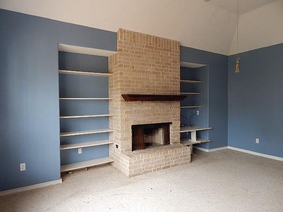 Den with fireplace