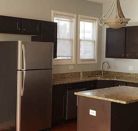 4th image of 1500 E 73rd Pl SE #2W