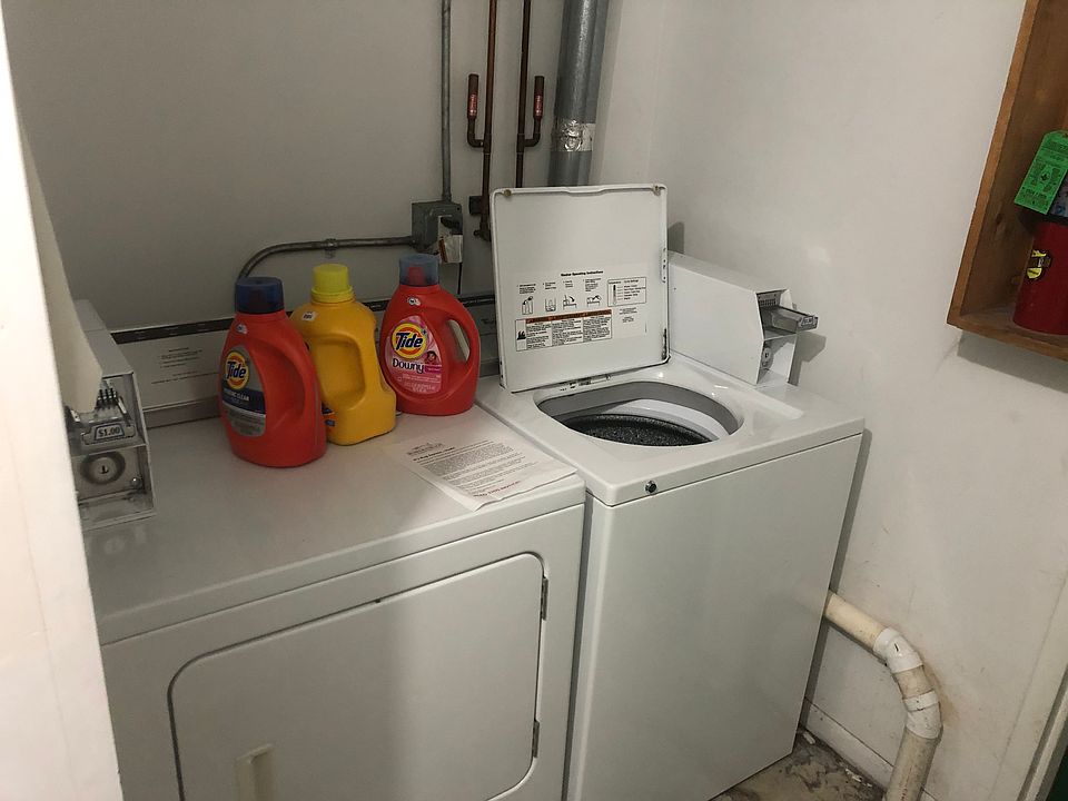 Shared washer and dryer, coin operated.