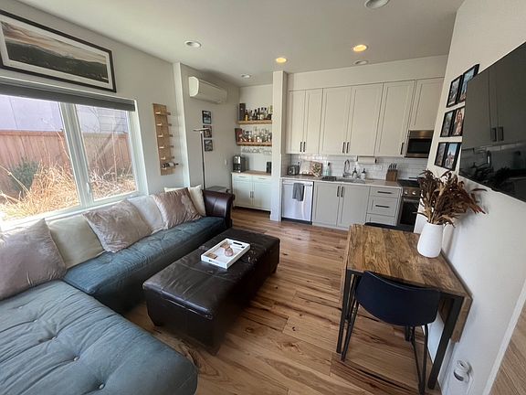 Included furnishings: Wine rack, sturdy bar shelves, and roller cabinet all included for added storage