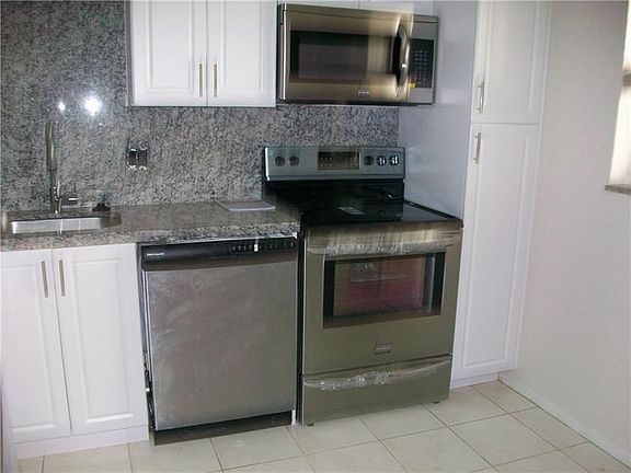 3rd image of 8401 N Lagos De Campo Blvd #102V