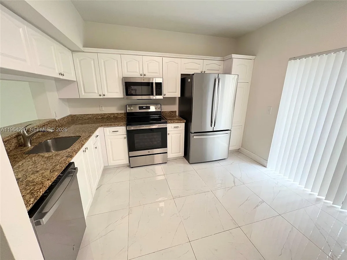 Building Photo - 9820 NW 56th Pl