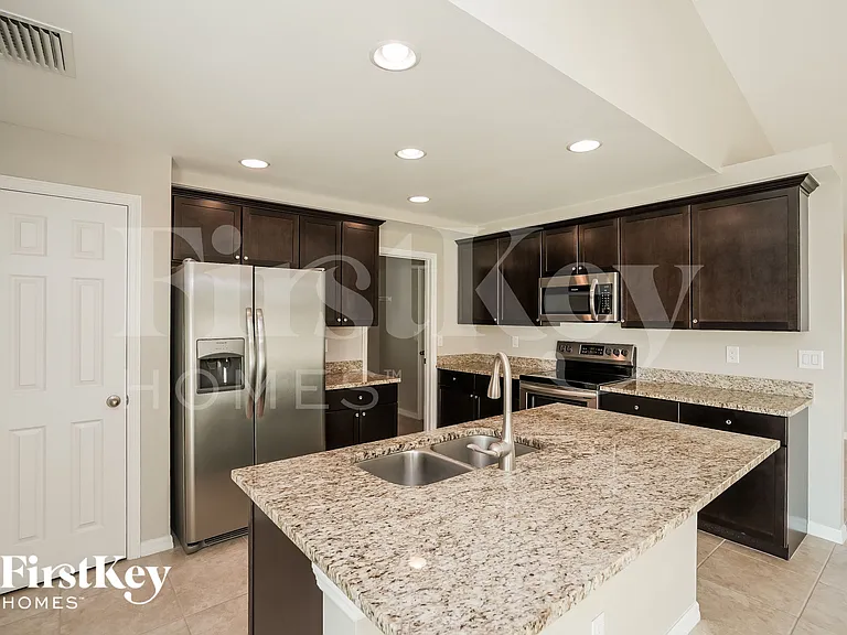 2127 NW 41st Pl — Photo 5