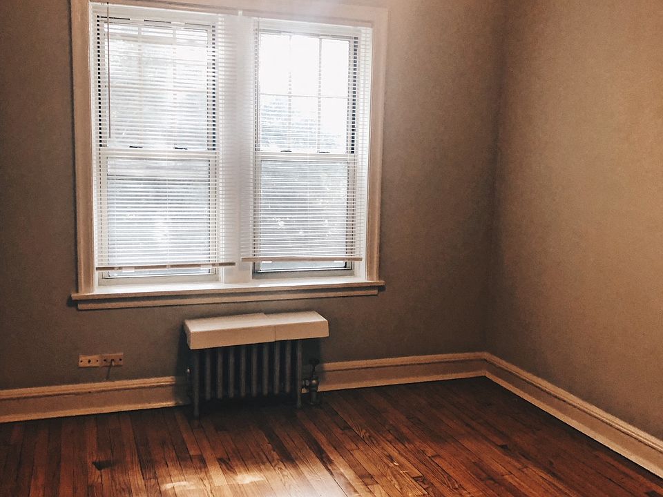 Bedroom - Gray Turnover & Hardwood Floor