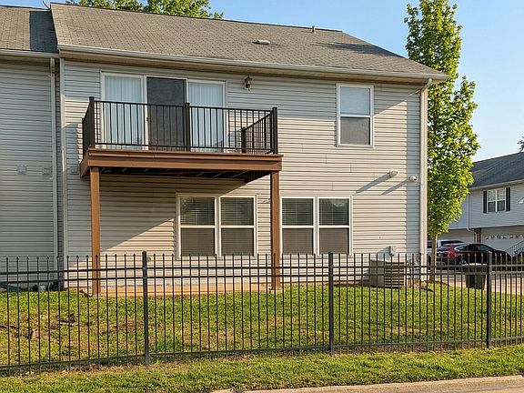 Back of Condo with a deck.