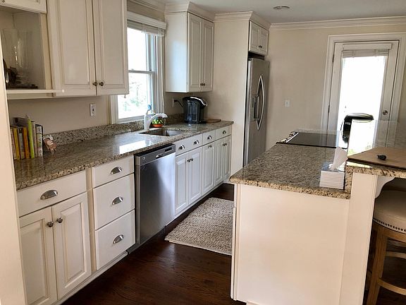 Granite counters and stainless steel appliances.