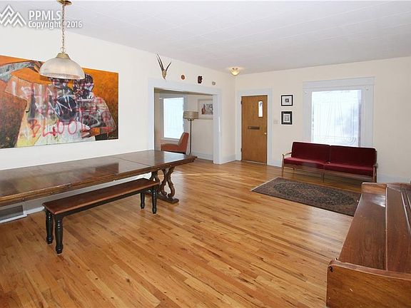 Original hard wood and trim around windows.