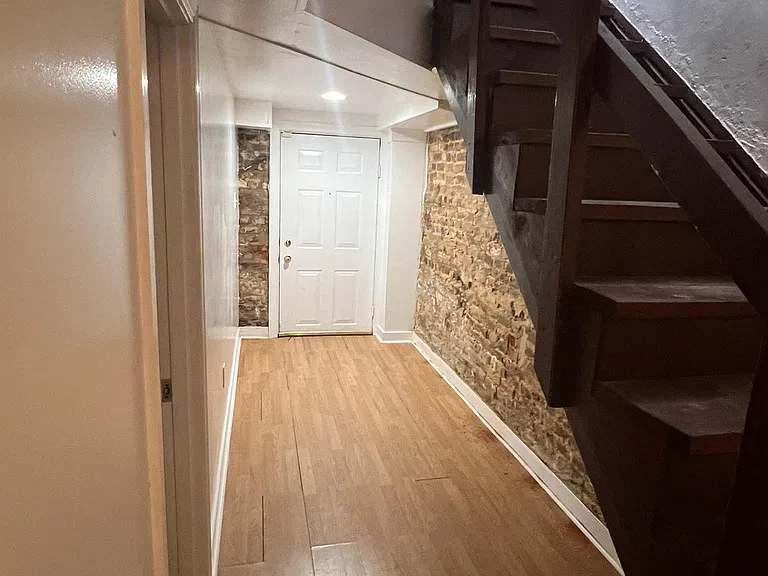 Under the downstairs (previously used to store bikes)