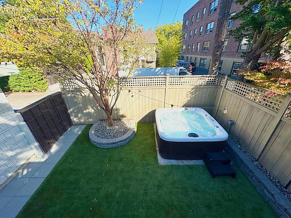 Gated entry to backyard, perfect for hosting and play