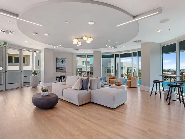 Unwind as the sun goes down in the rooftop lounge with floor-to-ceiling windows
