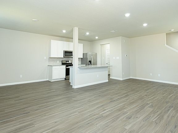 Family Room to Kitchen and Dining Area