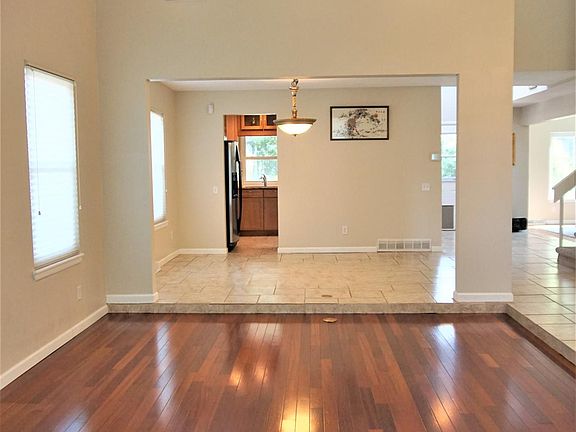 Spacious and open floor plan includes loft, sky lights and large bay window