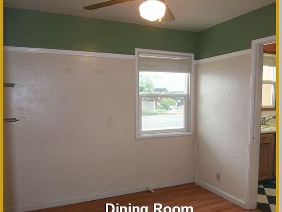 Dinning Room with light/ceiling fan.
