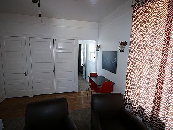 Living area w/ closets - one is a Murphy bed