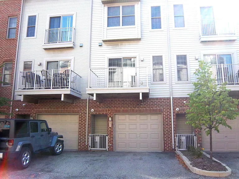 tandem garage with balcony above