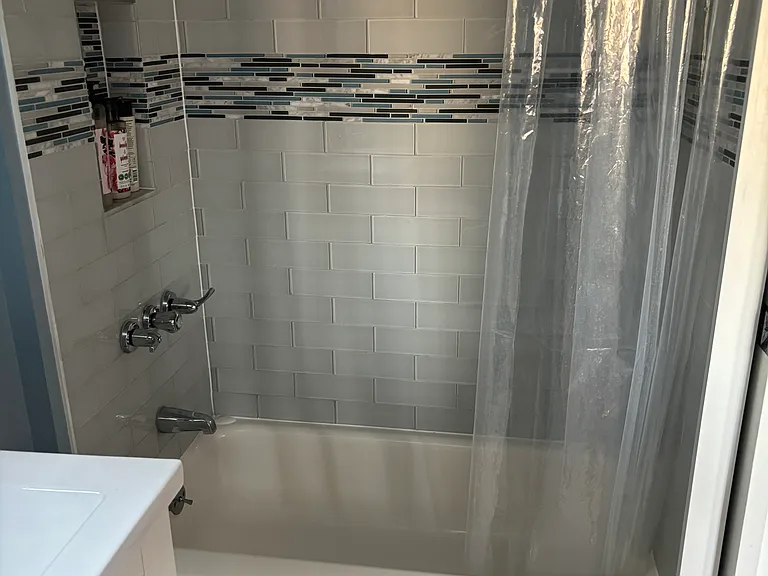 private bath with shower and tub
