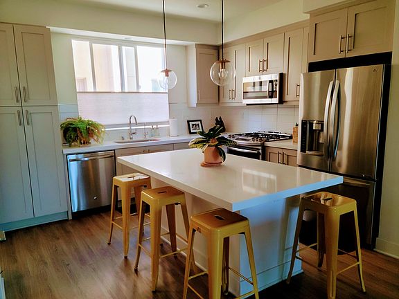 Kitchen includes all appliances including refrigerator