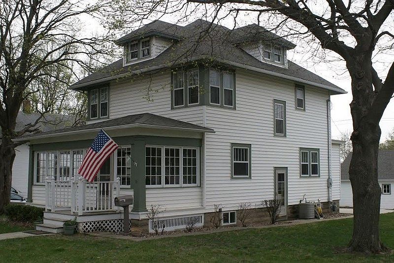 Great curb appeal on a large corner lot
						:
						The north side is rimmed in low maintence river rock beds and flowering bushes.