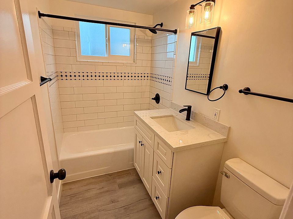 Remodeled Bathroom, 36" Cabinet with Storage, New Hardware and Plumbing Fixtures, New Tile, Vanity, and Sink