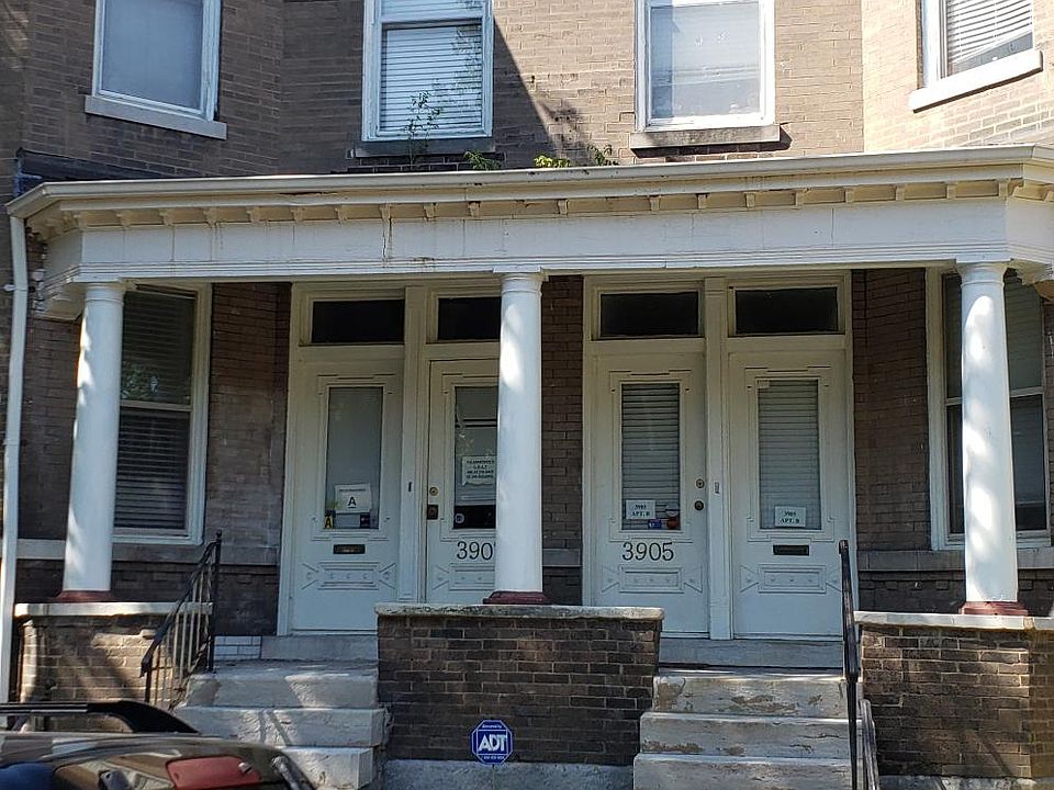 Entrance to unit is located at the back of the building, not accessible through these doors