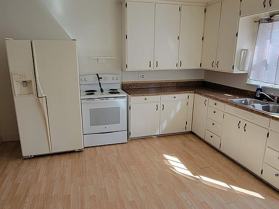 Kitchen is 12ft by 13ft6in.