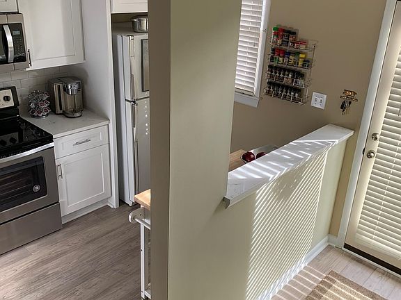 Half bath is off front door to the left. No photo at this time but newly painted.