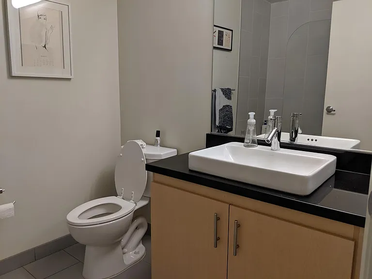 Bath with tub+shower.
