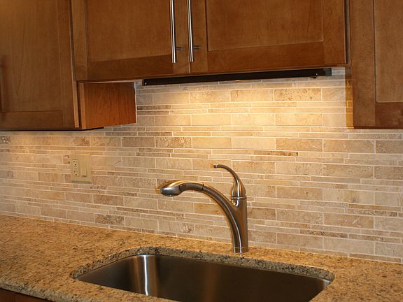 Granite countertops with stone backsplash