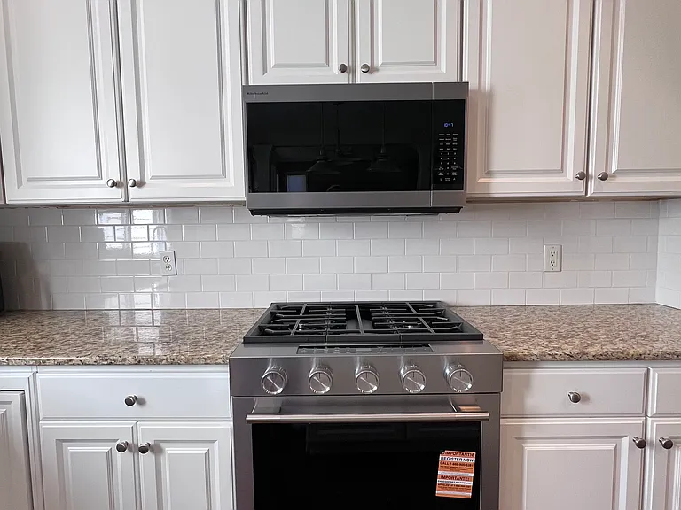 Kitchen with new oven and microwave